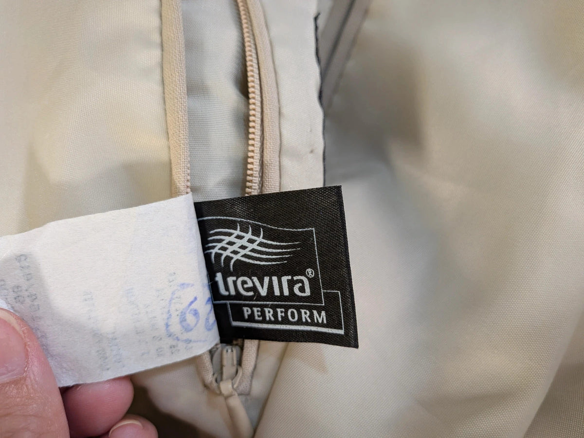Travelmaster beige three-piece suit with classic lapel and three-button jacket design.