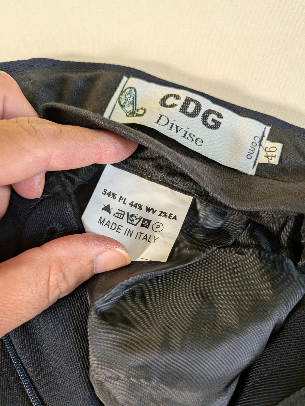 Pura Lana Vergine navy jacket double-breasted with original CDG Divise tag.