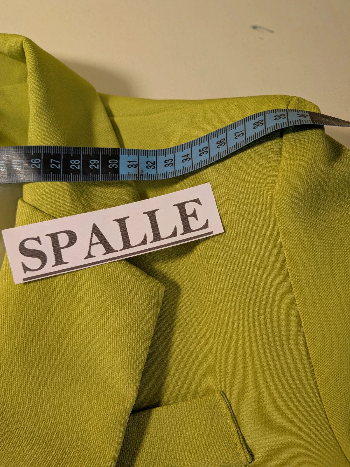 New Collection multi suit set lime green single-button blazer and straight-leg pants.