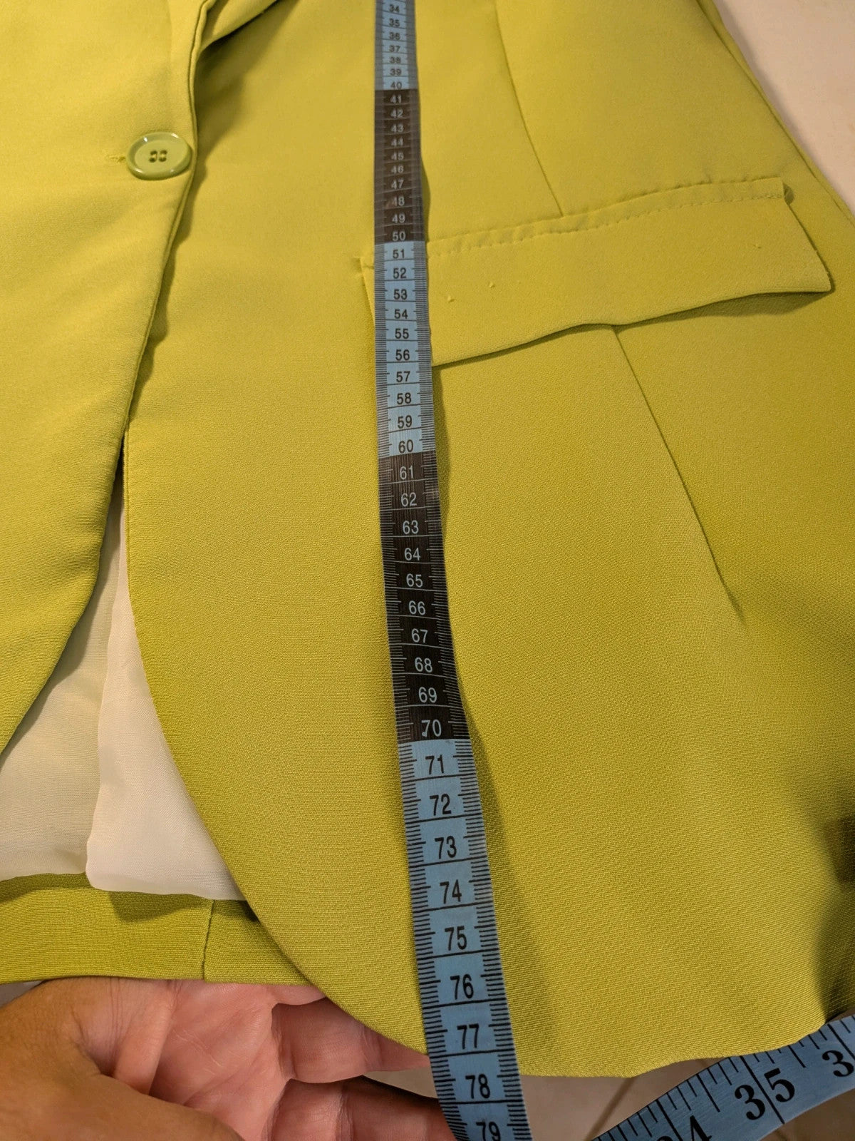 New Collection multi suit set lime green single-button blazer and straight-leg pants.