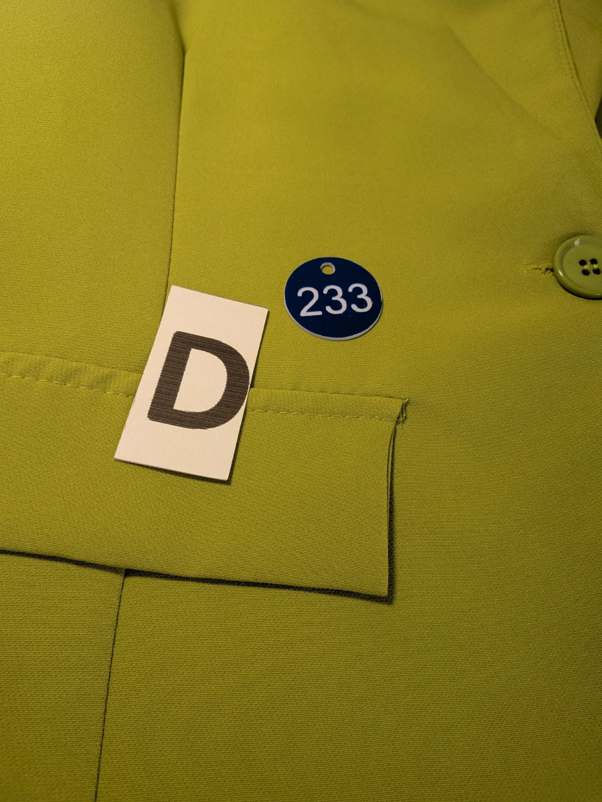 New Collection multi suit set lime green single-button blazer and straight-leg pants.