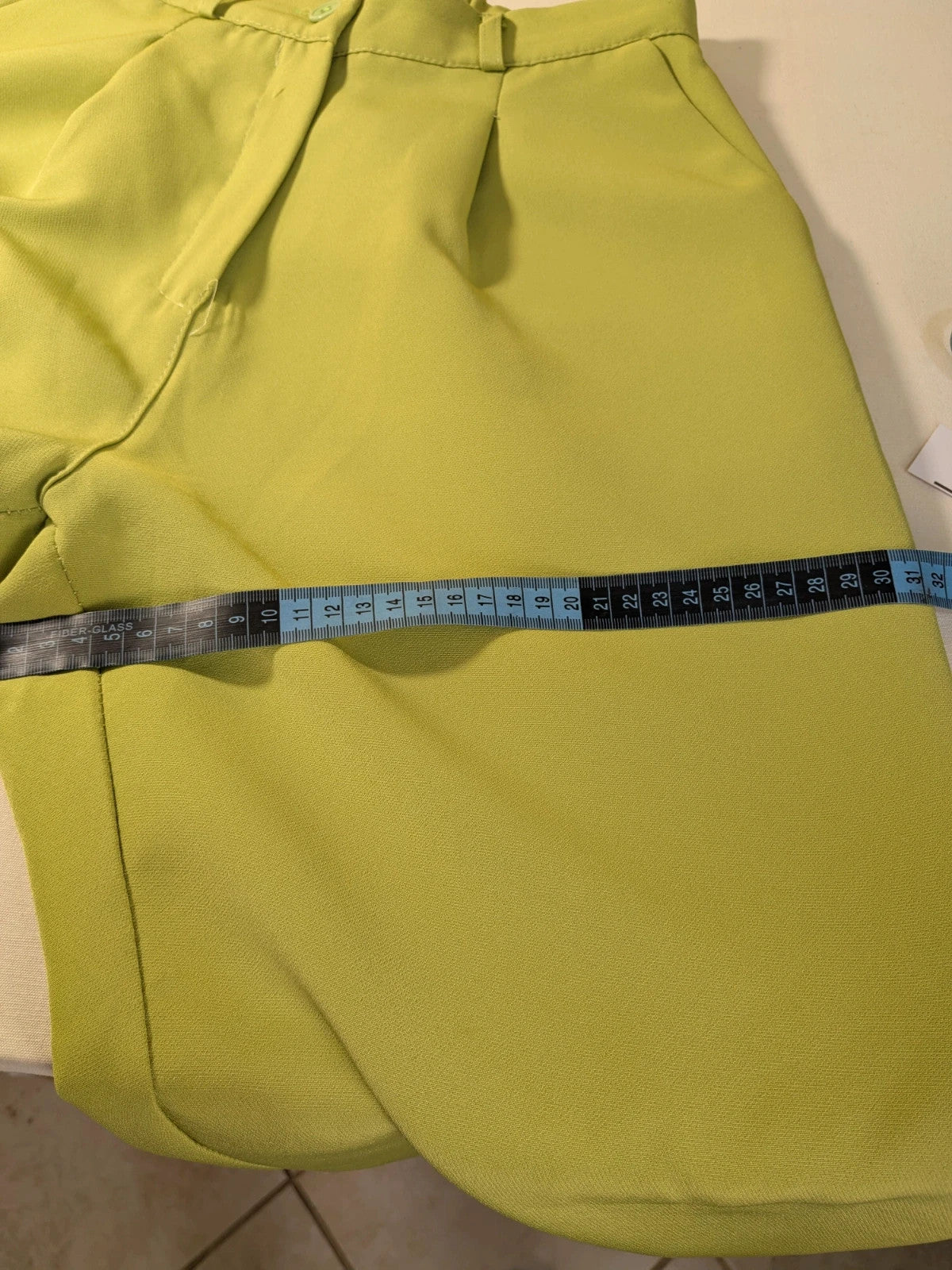 New Collection multi suit set lime green single-button blazer and straight-leg pants.