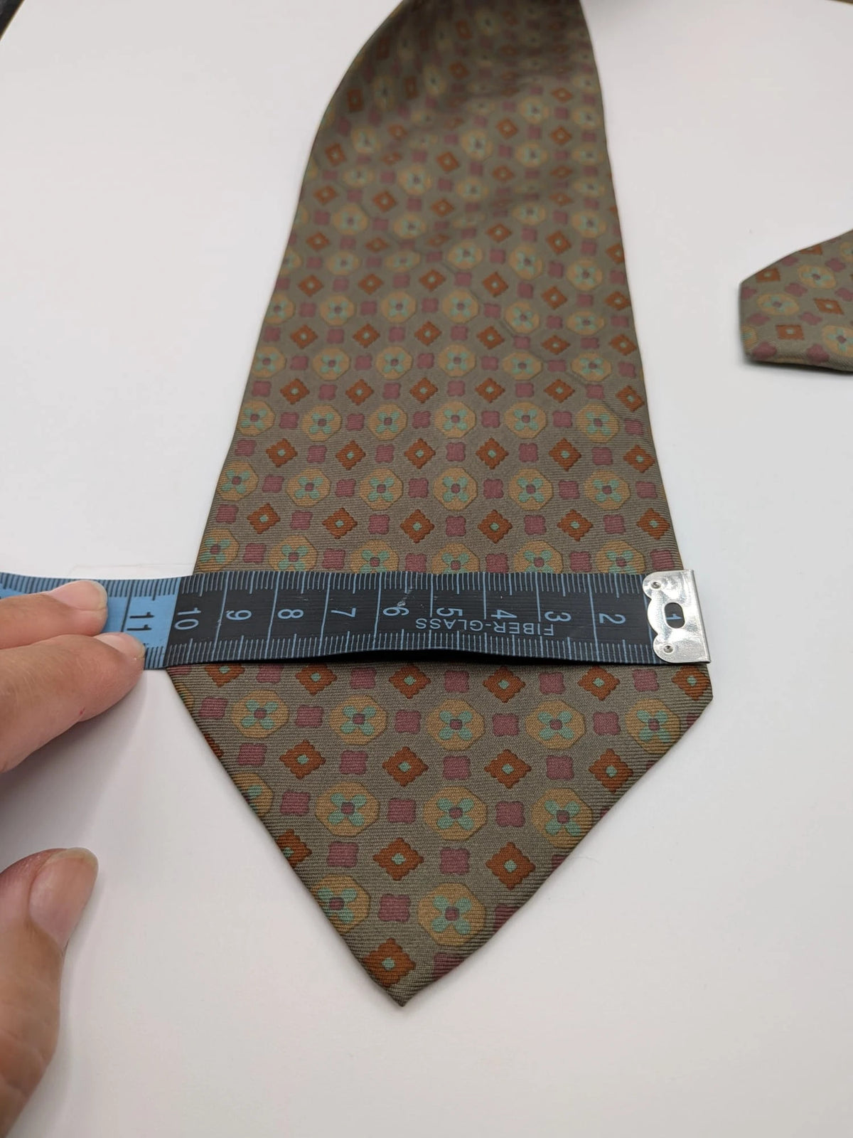 Made in Italy brown multi tie geometric floral pattern with dark blue back.
