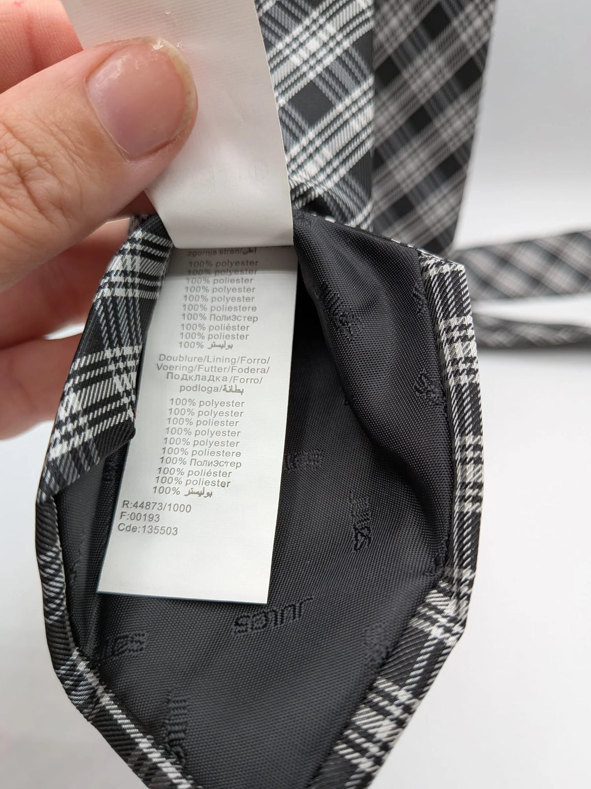 Jules tie black white gray tartan pattern 100% polyester fabric.