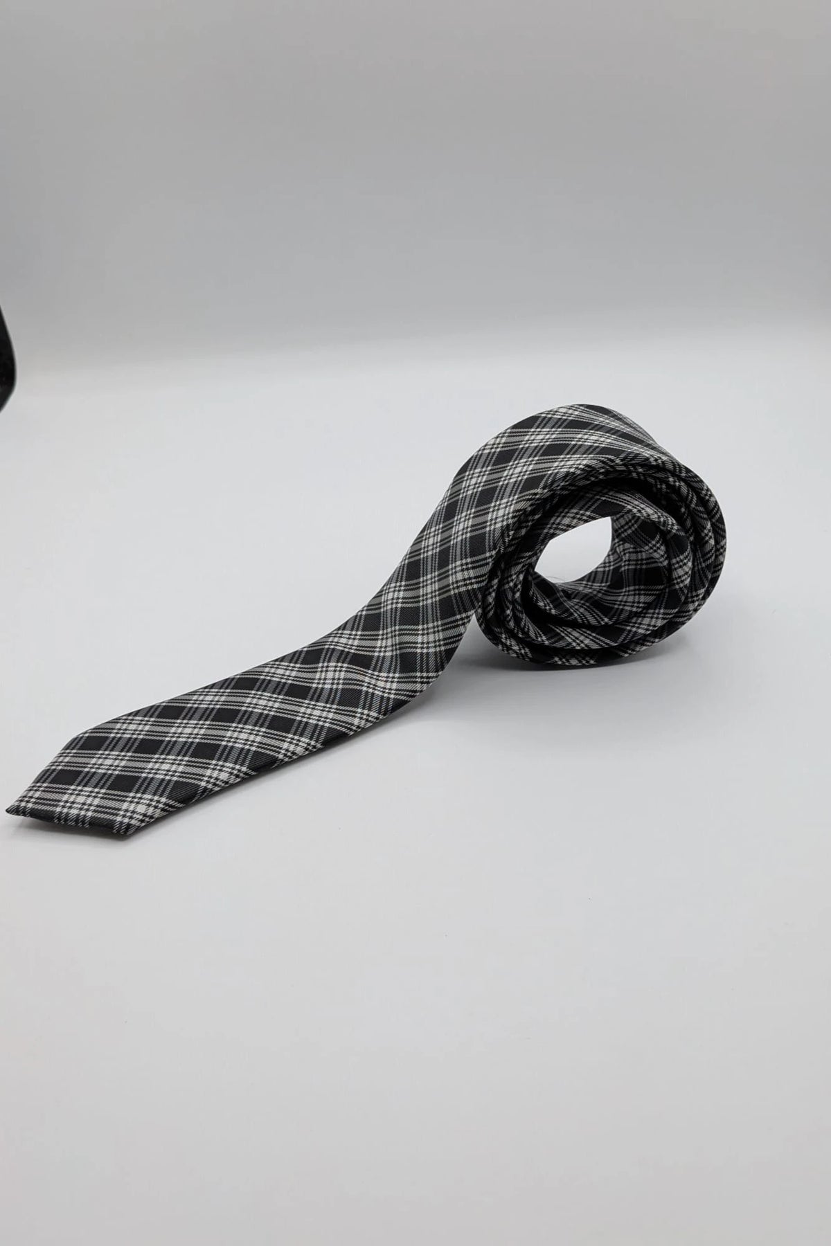 Jules tie black white gray tartan pattern 100% polyester fabric.