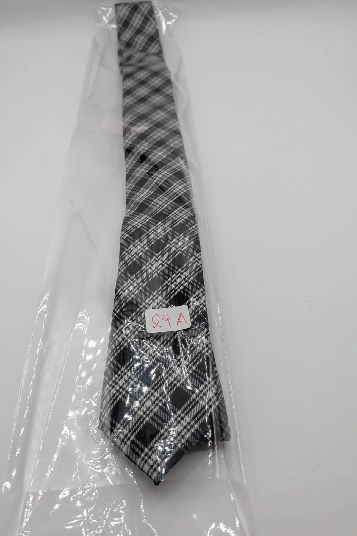 Jules tie black white gray tartan pattern 100% polyester fabric.
