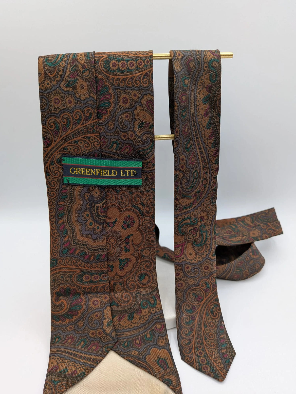 Greenfield brown paisley tie 100% silk with Made in Italy label and rich pattern.