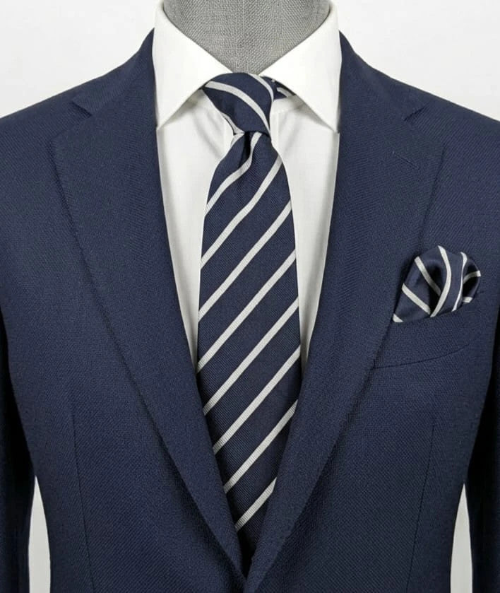 Camcissima navy tie 100% silk with white diagonal stripes and classic design.