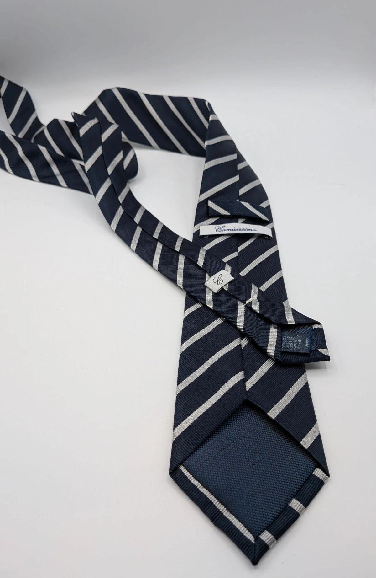 Camcissima navy tie 100% silk with white diagonal stripes and classic design.