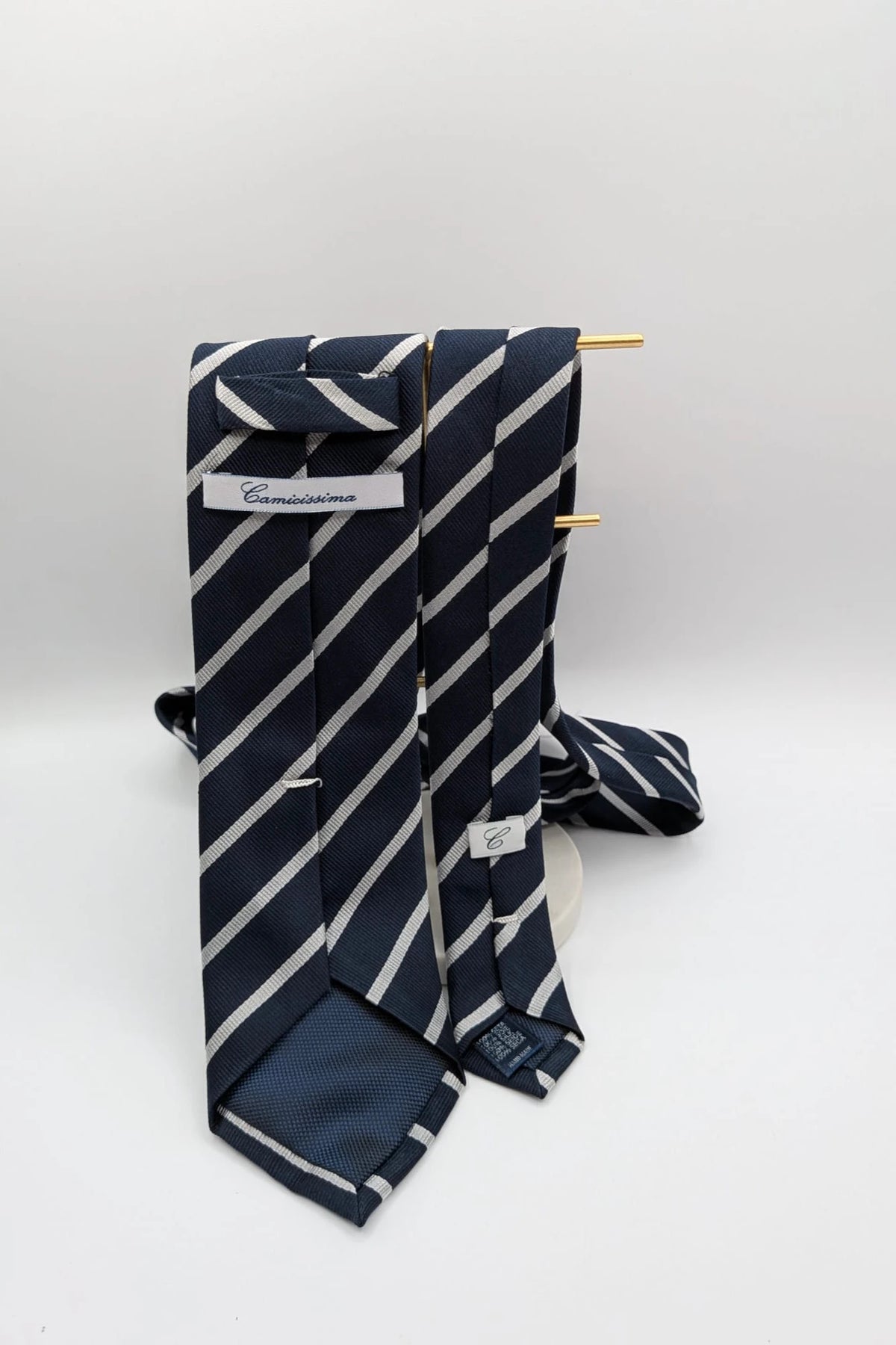 Camcissima navy tie 100% silk with white diagonal stripes and classic design.