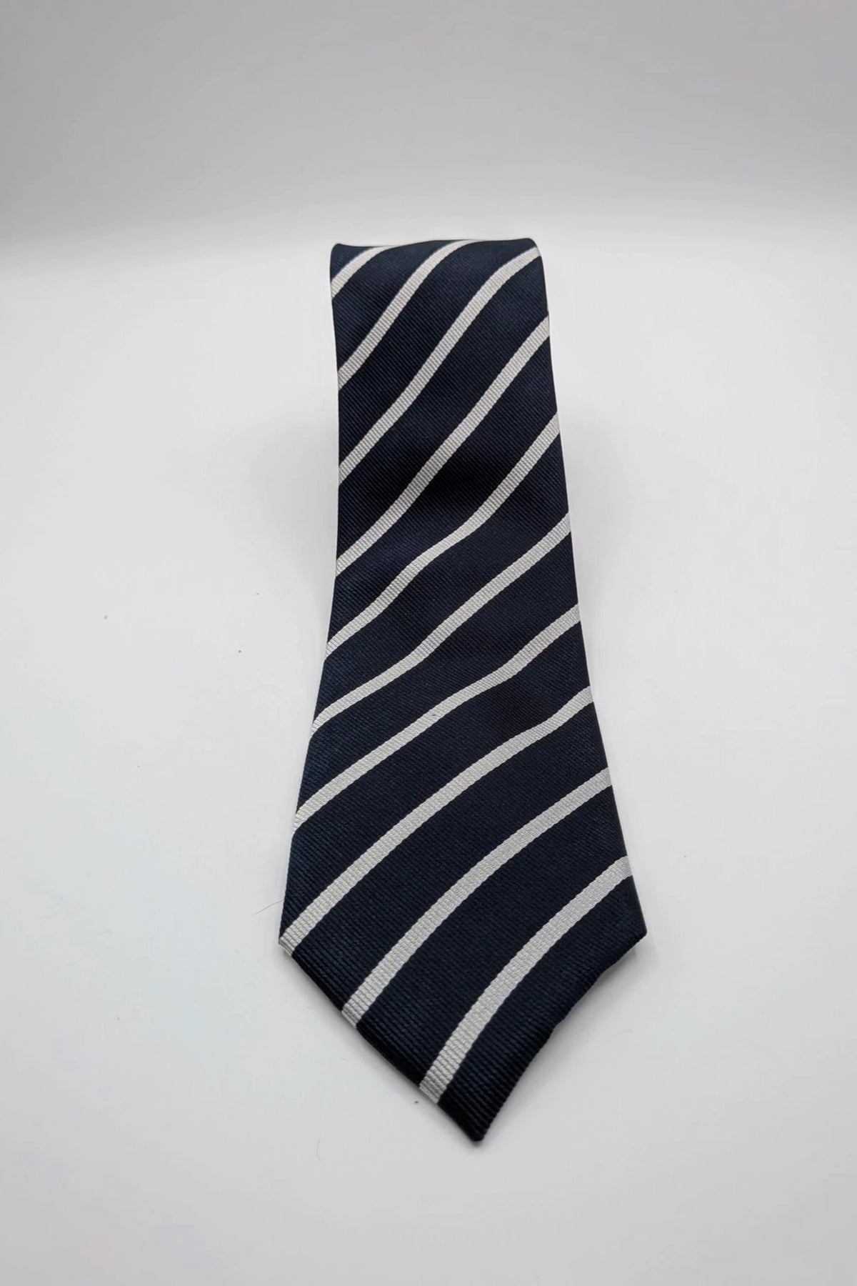Camcissima navy tie 100% silk with white diagonal stripes and classic design.