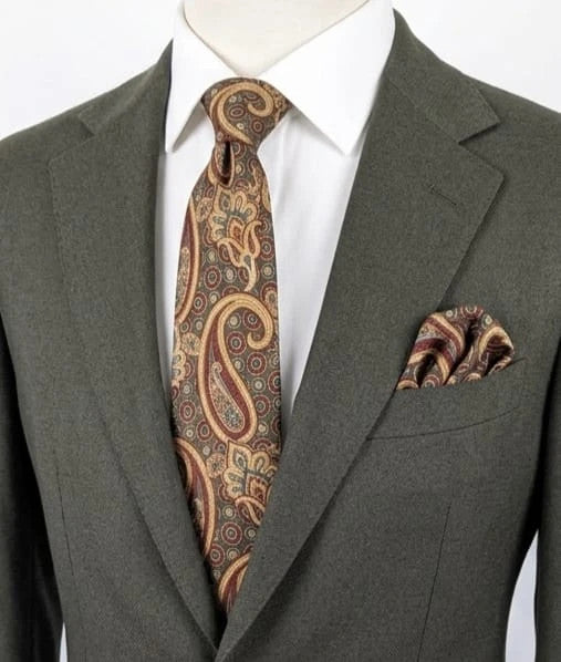 Uomo brown paisley tie in crèpe de chine with gold, blue, and burgundy patterns.