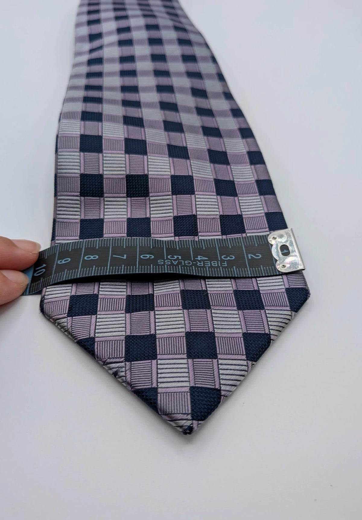Uomo navy tie 100% silk geometric plaid pattern in purple and gray.
