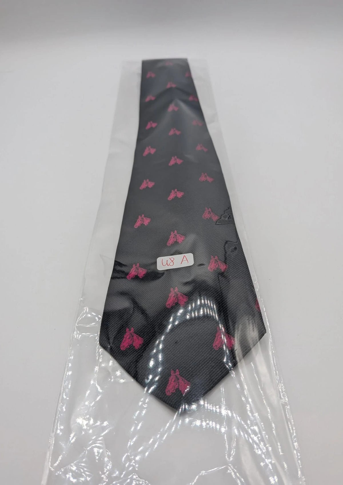 Vintage Dressing black tie with pink horse head pattern, 100% silk, Made in Italy.