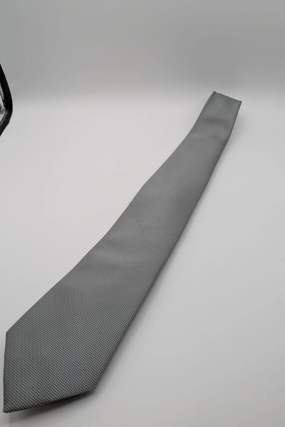 Cotton & Silk grey tie with black micro check pattern and polyester material.