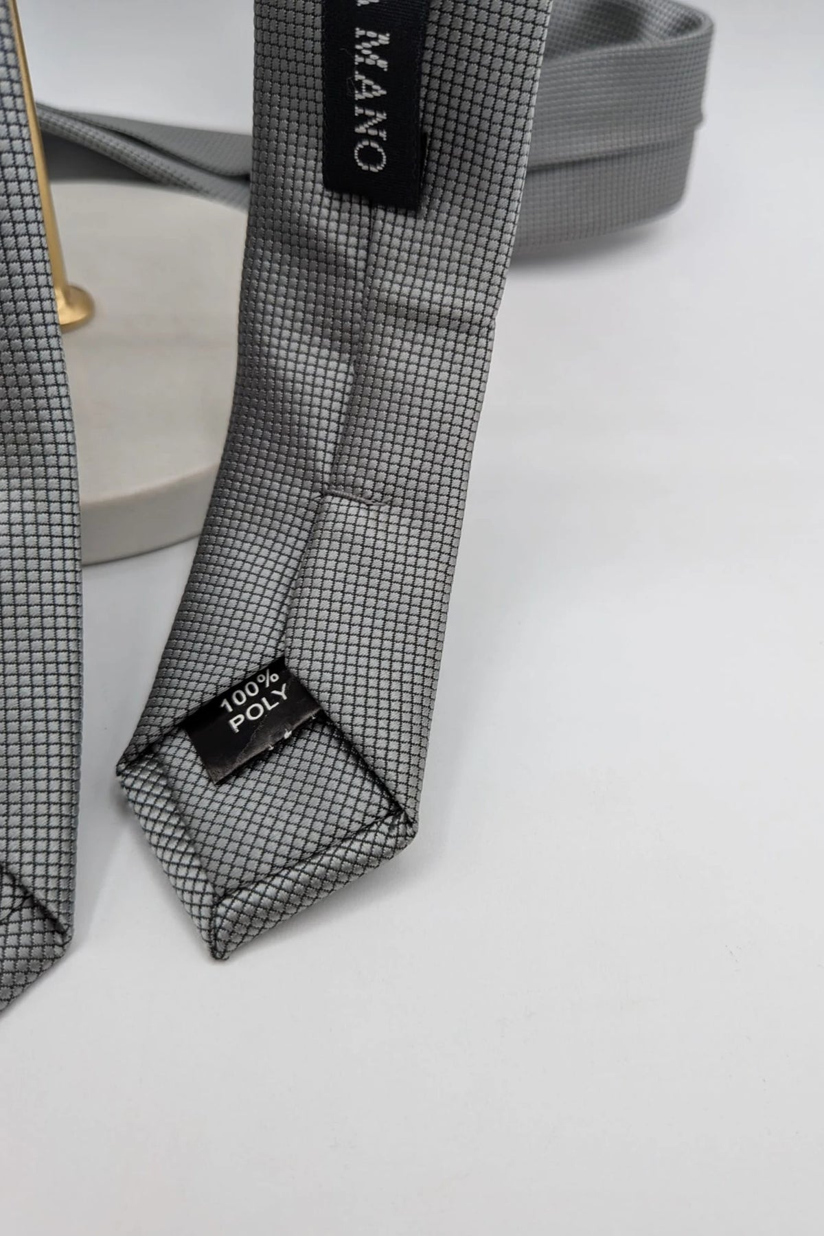 Cotton & Silk grey tie with black micro check pattern and polyester material.