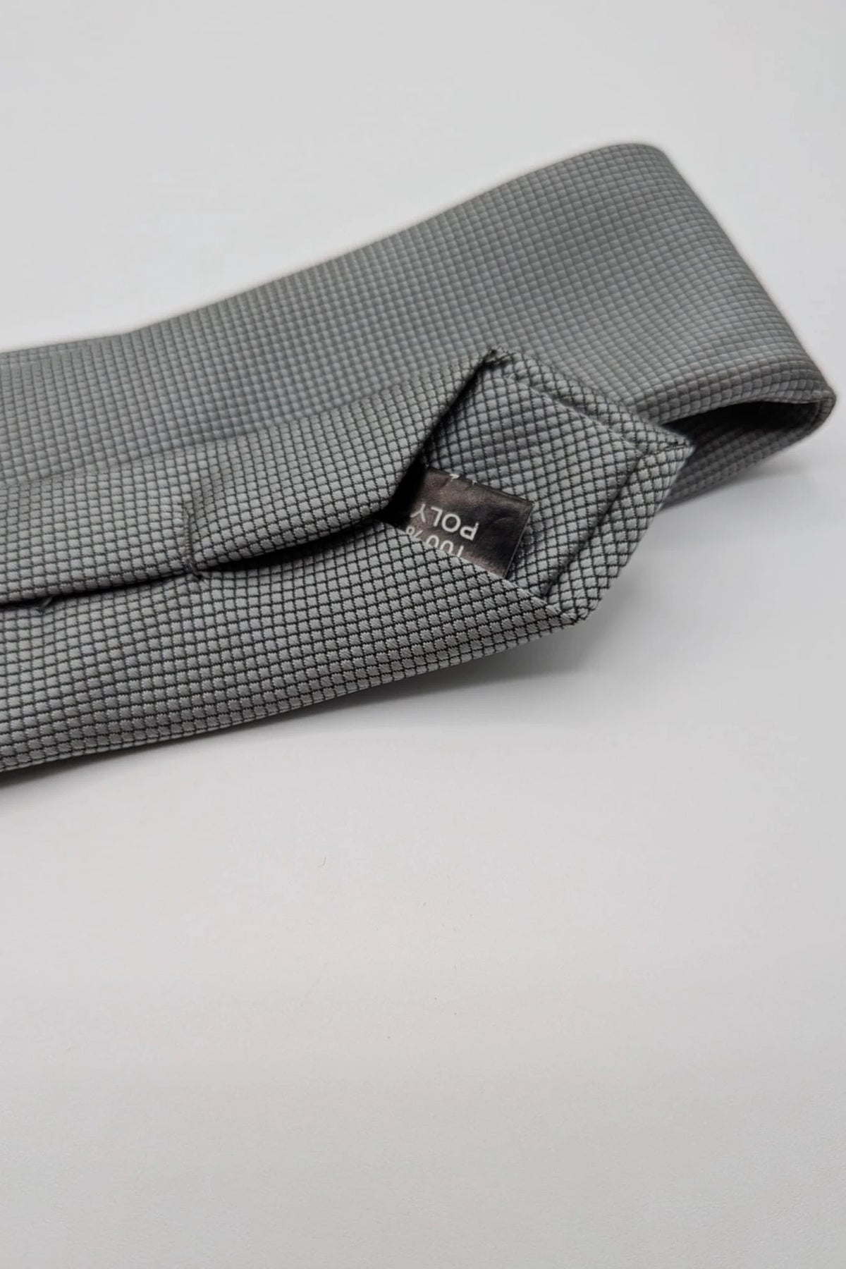 Cotton & Silk grey tie with black micro check pattern and polyester material.