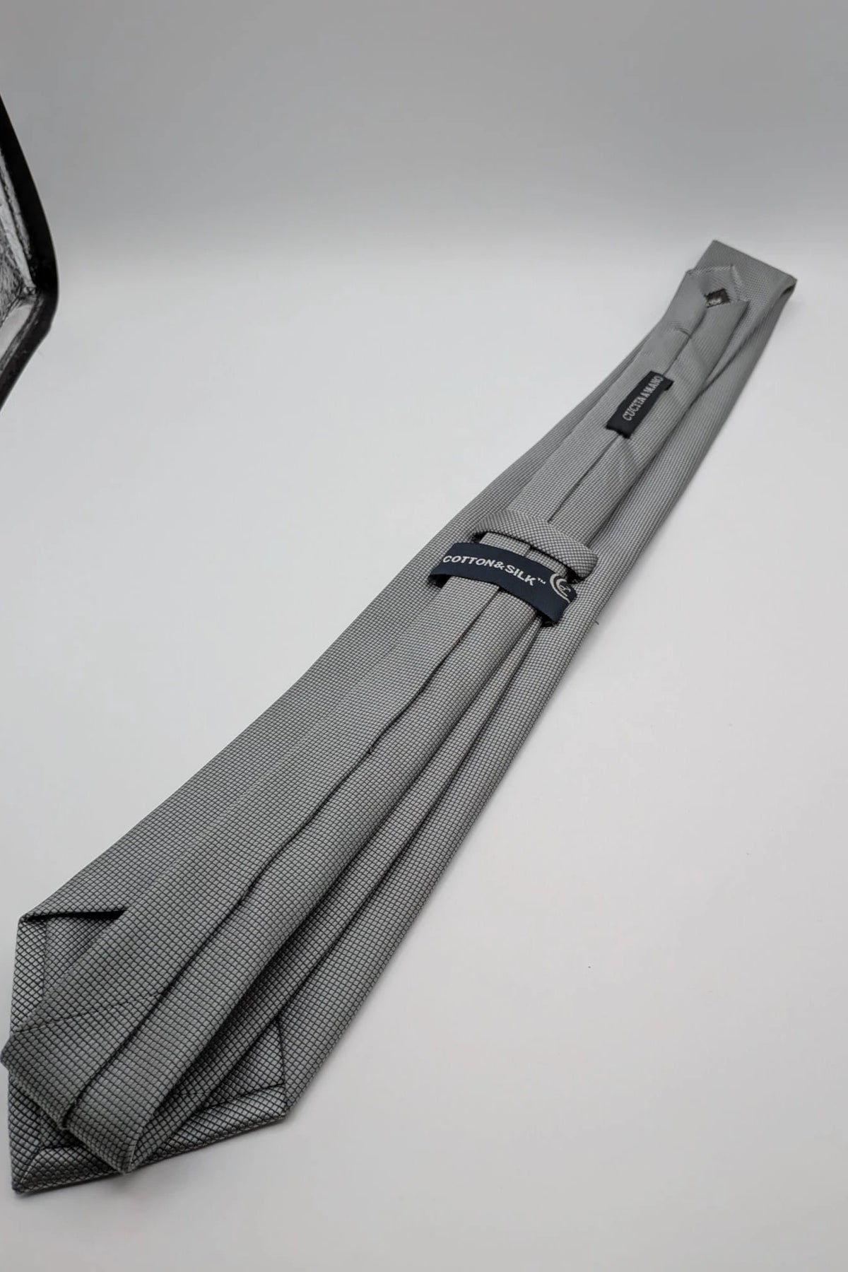 Cotton & Silk grey tie with black micro check pattern and polyester material.