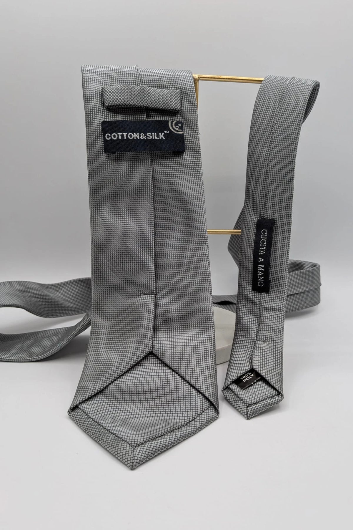 Cotton & Silk grey tie with black micro check pattern and polyester material.