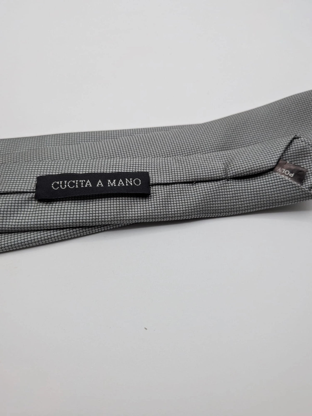 Cotton & Silk grey tie with black micro check pattern and polyester material.