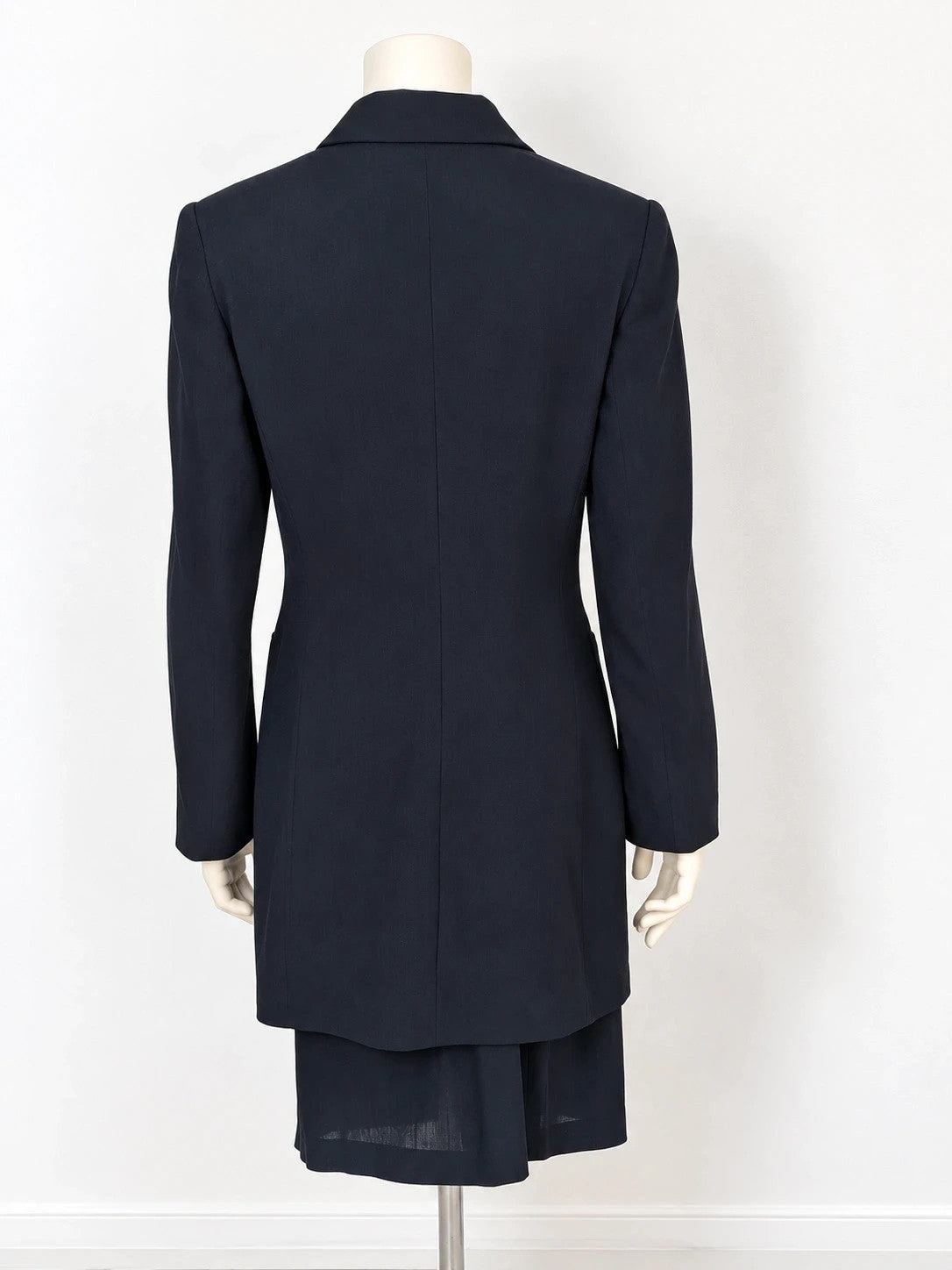 Amuleti navy skirt suit 100% virgin wool, elegant tailored design with button closure.