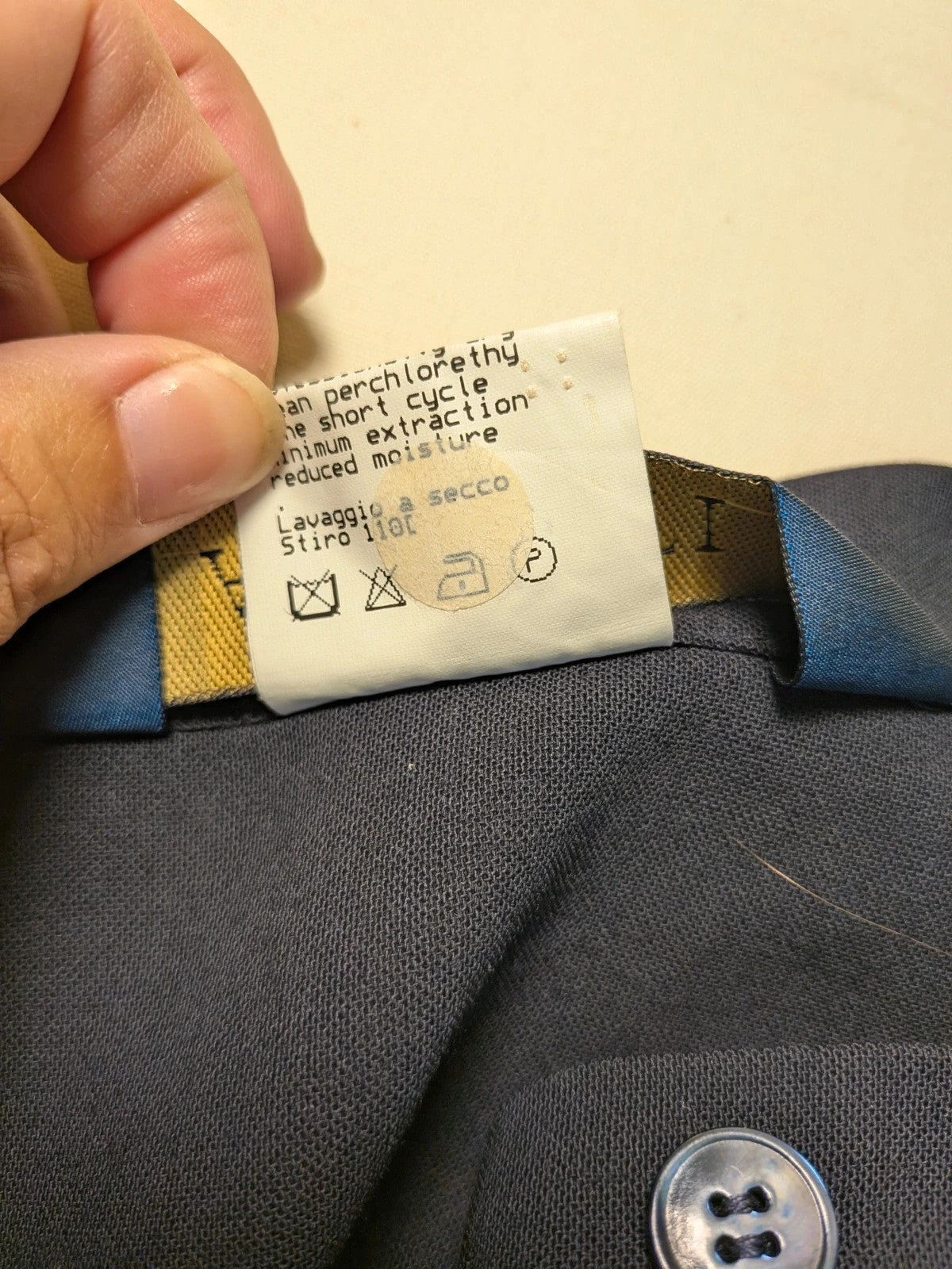 Amuleti navy skirt suit 100% virgin wool, elegant tailored design with button closure.