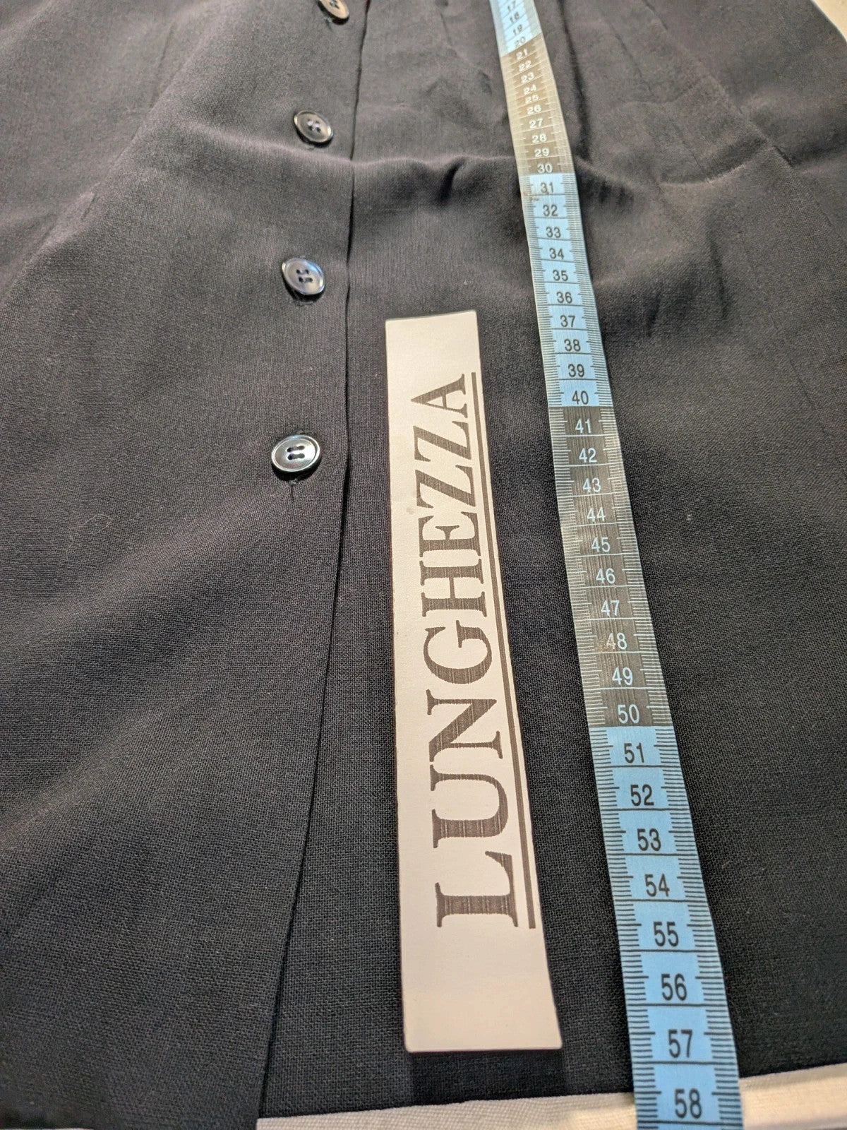 Amuleti navy skirt suit 100% virgin wool, elegant tailored design with button closure.