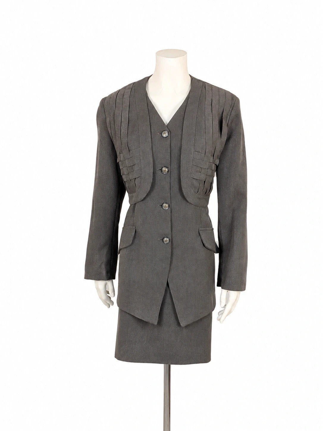 M-Made in Italy grey skirt suit with pleated jacket and decorative buttons.