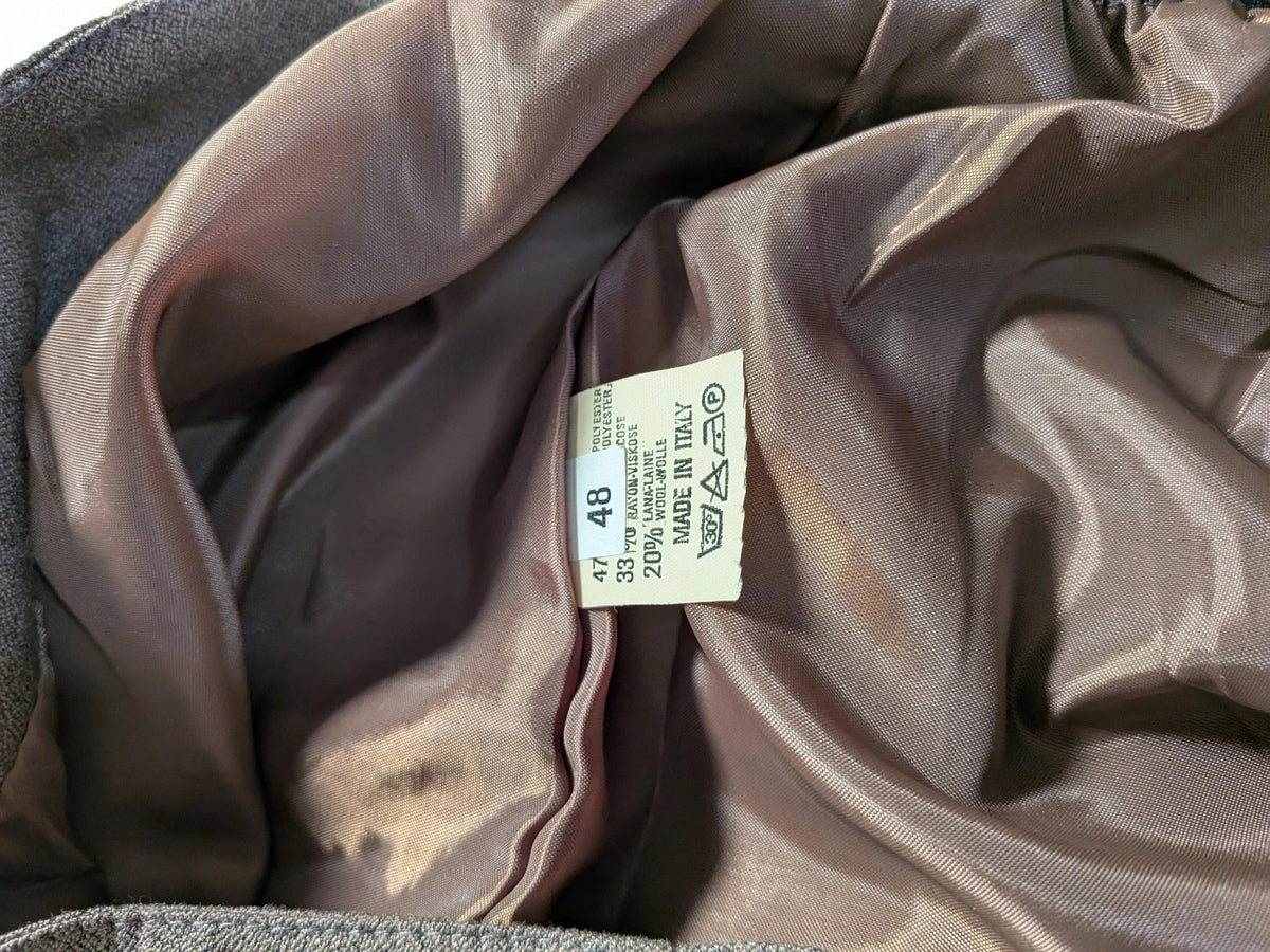 M-Made in Italy grey skirt suit with pleated jacket and decorative buttons.
