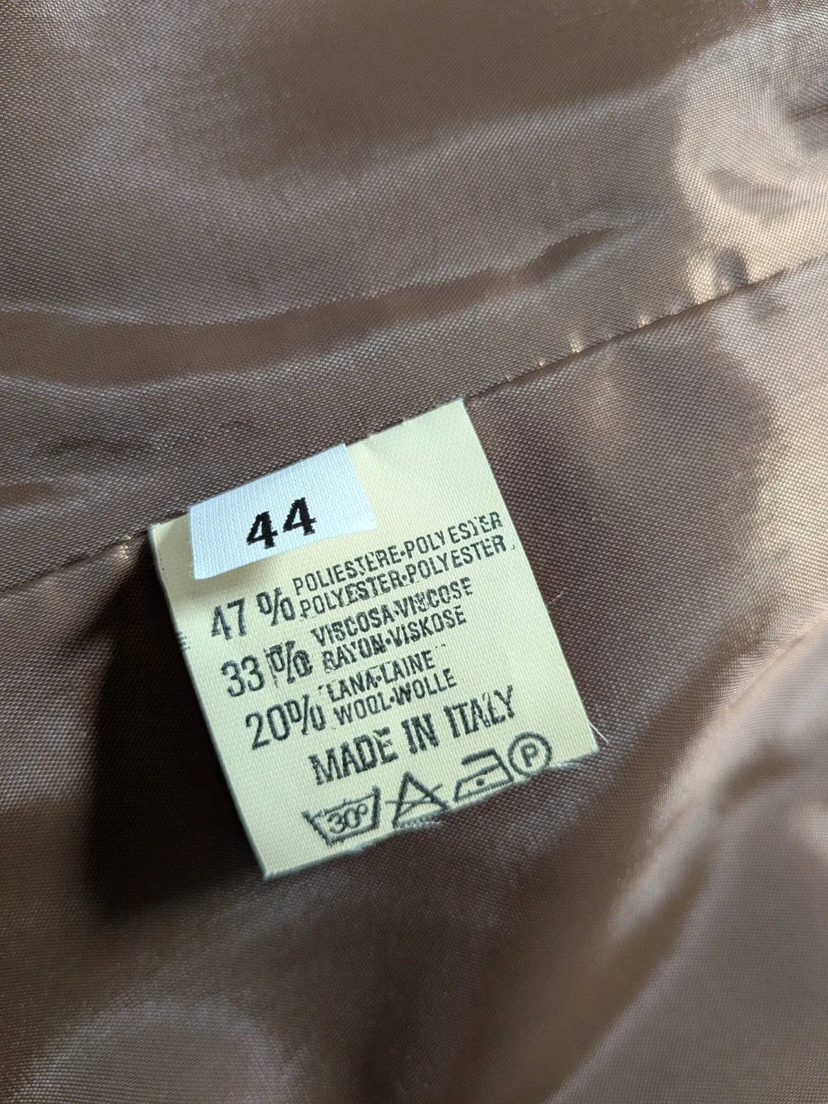 M-Made in Italy grey skirt suit with pleated jacket and decorative buttons.
