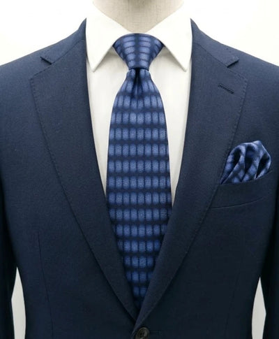 Cravatta vintage in 100% seta blu con fantasia geometrica a ovali azzurri