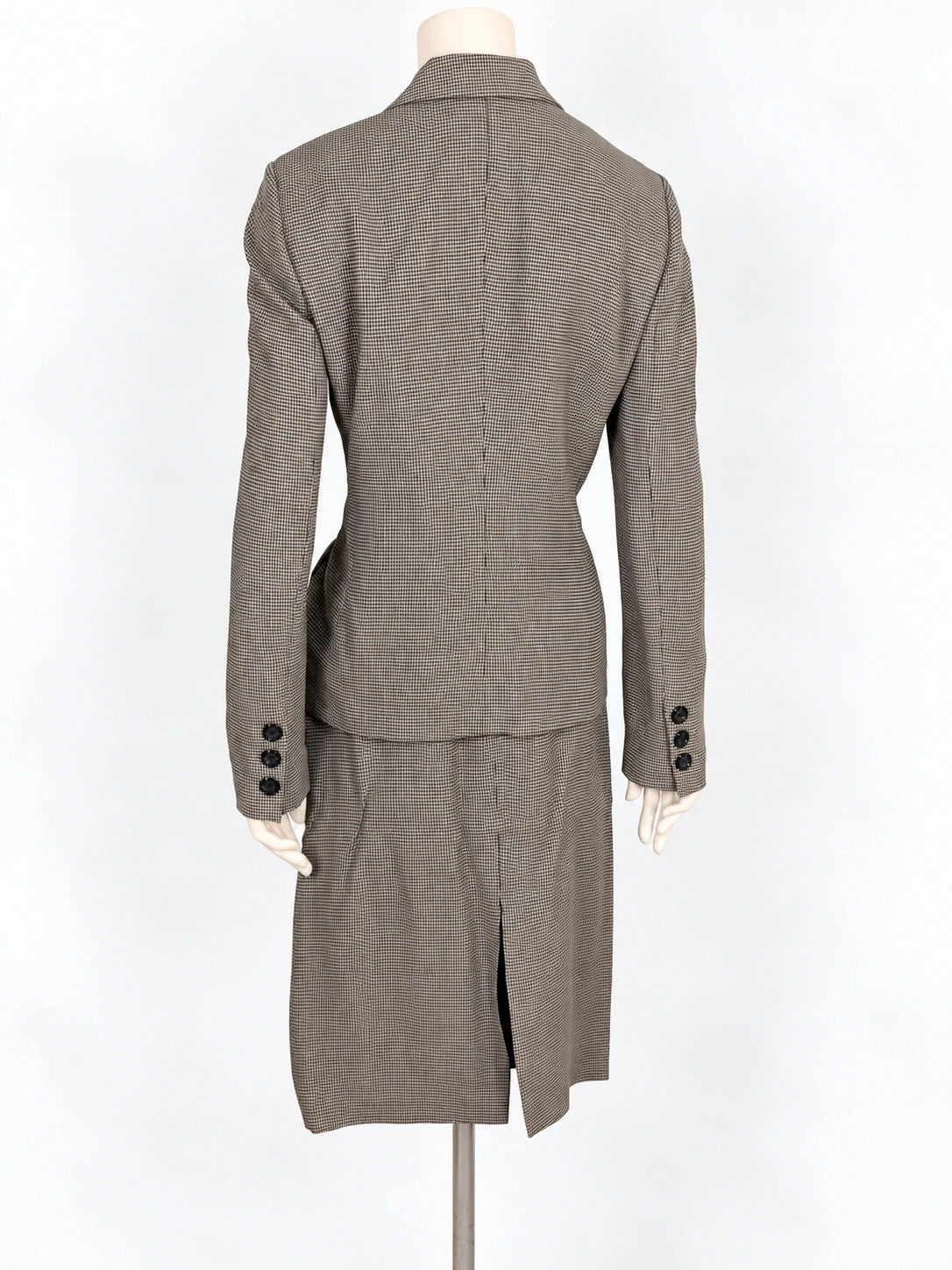 Luca D'Altieri beige and black skirt suit, micro pied de poule pattern, elegant design.