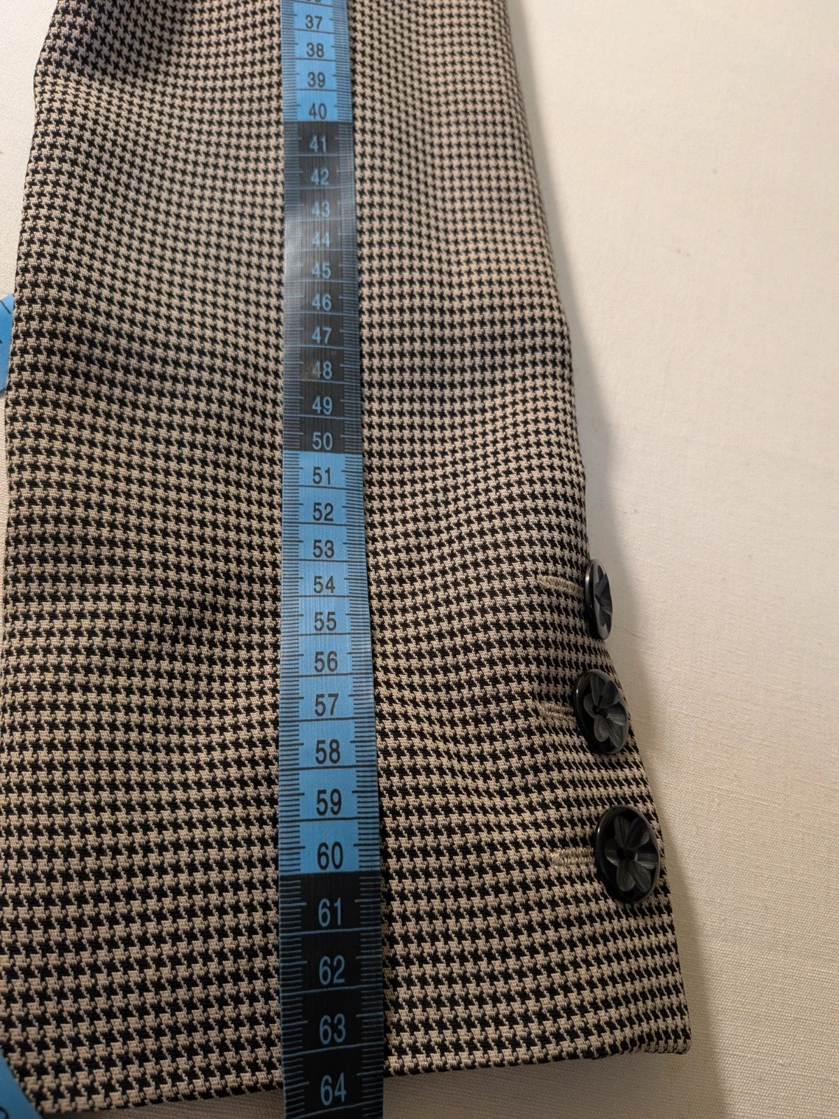 Luca D'Altieri beige and black skirt suit, micro pied de poule pattern, elegant design.