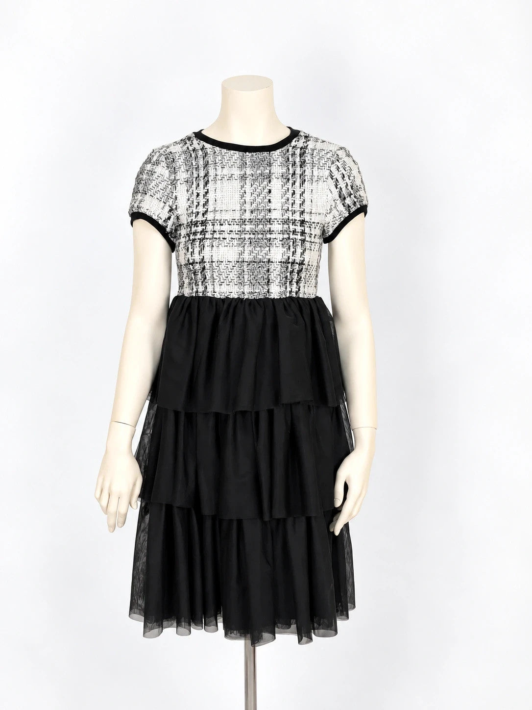 Gaialuna black and white bandage dress with bouclé fabric and tulle ruffles.
