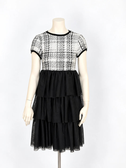 Gaialuna black and white bandage dress with bouclé fabric and tulle ruffles.