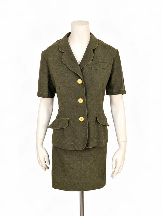 Oliva khaki skirt suit Freeling with textured fabric, short sleeve jacket, and sleeveless dress.