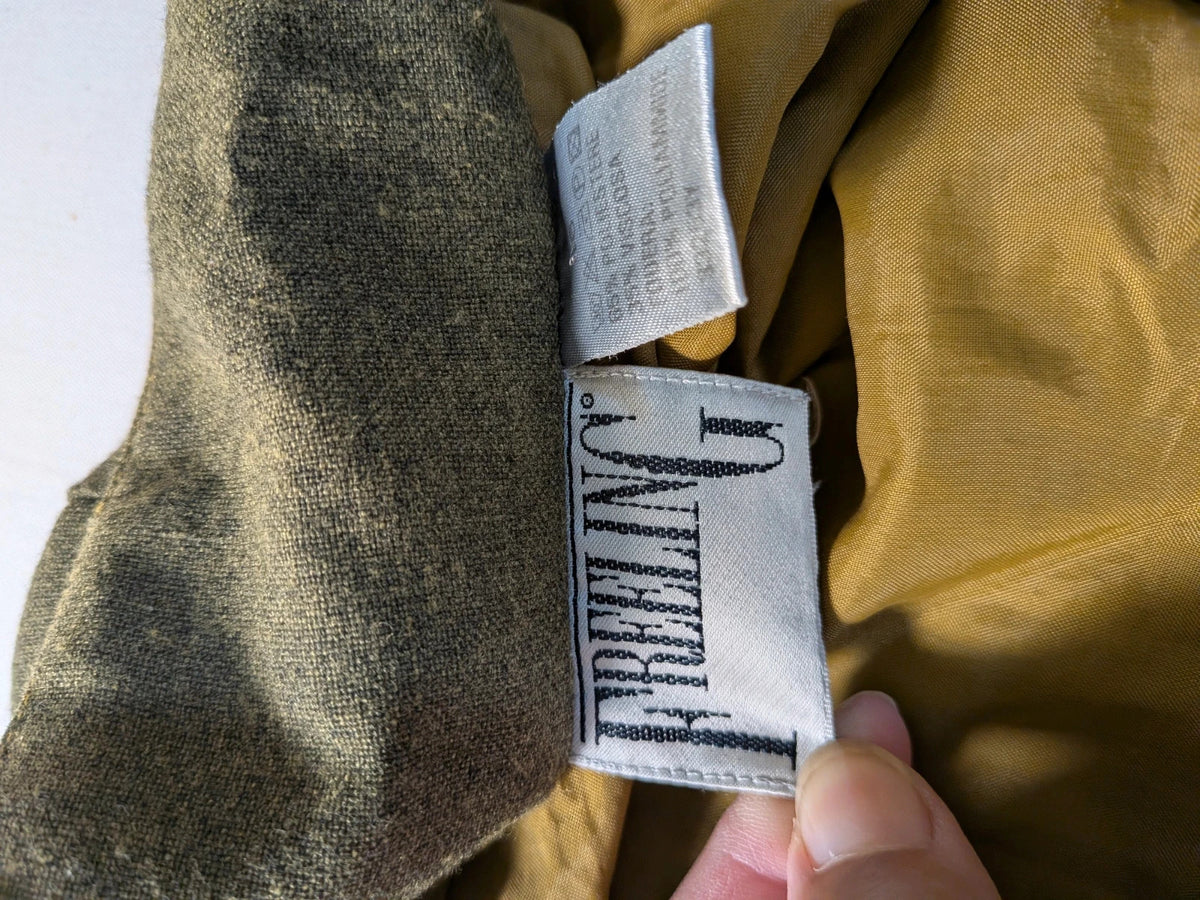 Oliva khaki skirt suit Freeling with textured fabric, short sleeve jacket, and sleeveless dress.