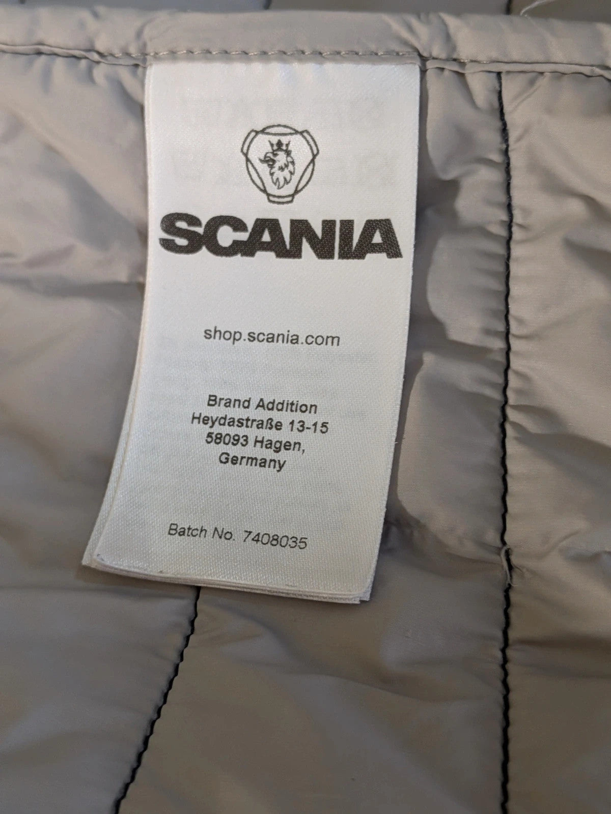 Giubbino trapuntato Scania Official Merchandise blu scuro con cappuccio e patch gommata