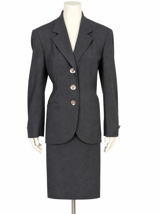 Tailleur donna Forma Zero by GFF grigio antracite in lana vergine, giacca avvitata e gonna dritta