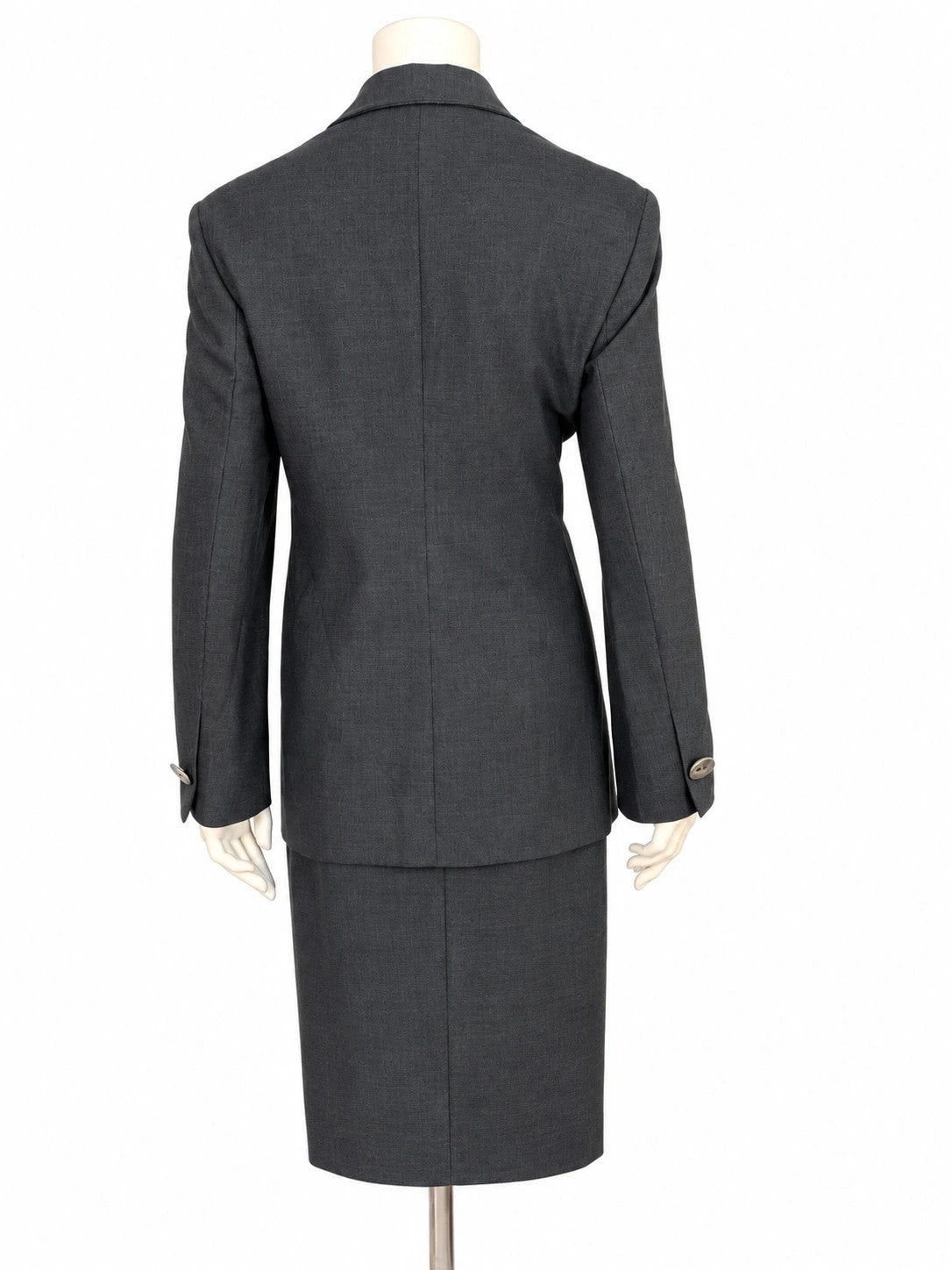 Tailleur donna Forma Zero by GFF grigio antracite in lana vergine, giacca avvitata e gonna dritta