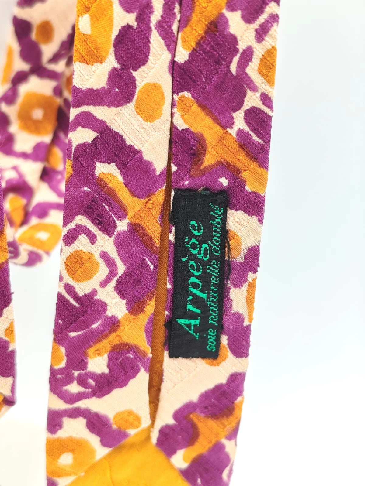 Cravatta vintage Ruffatti Torino in seta, fantasia geometrica viola e ocra