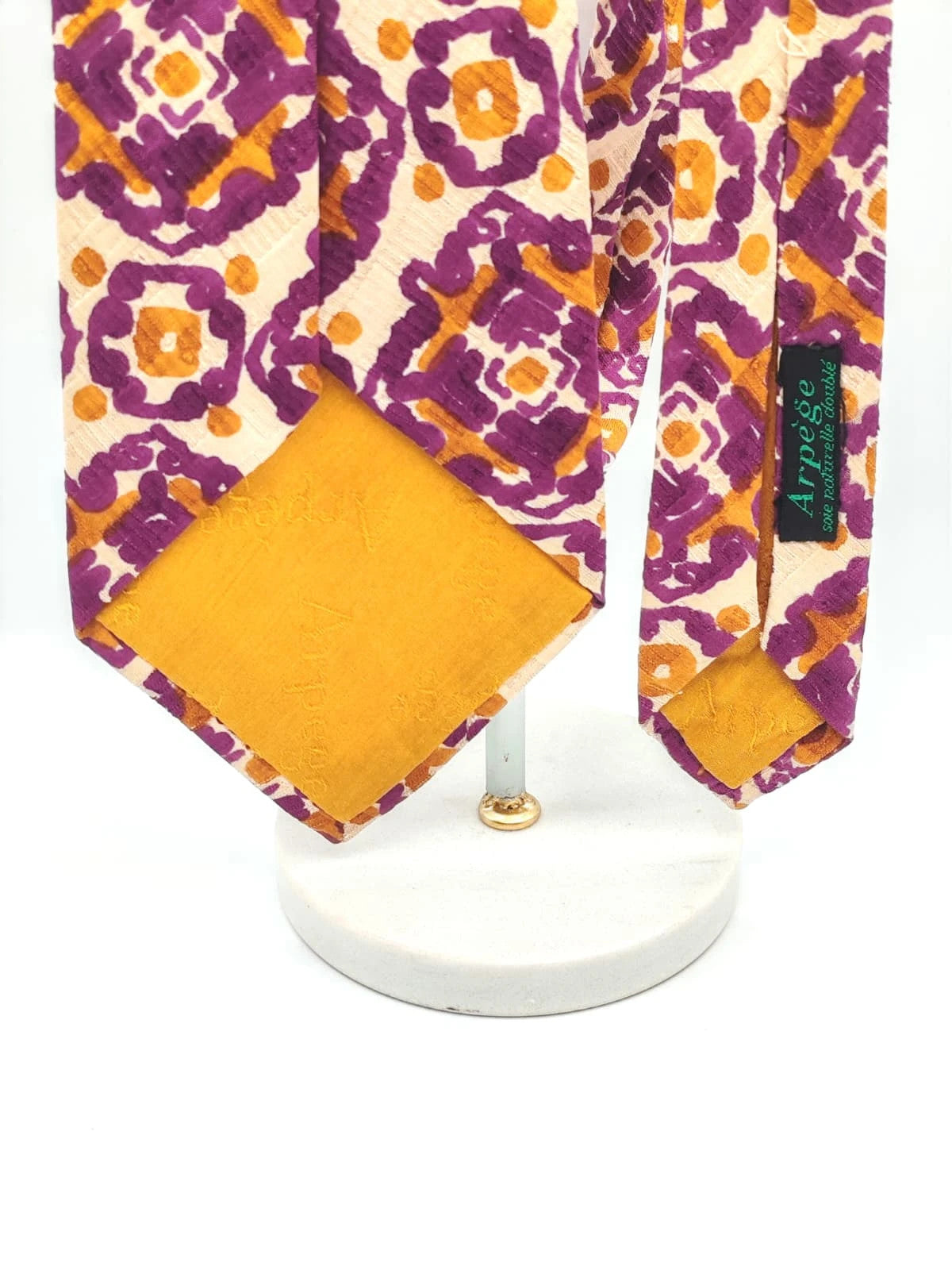 Cravatta vintage Ruffatti Torino in seta, fantasia geometrica viola e ocra
