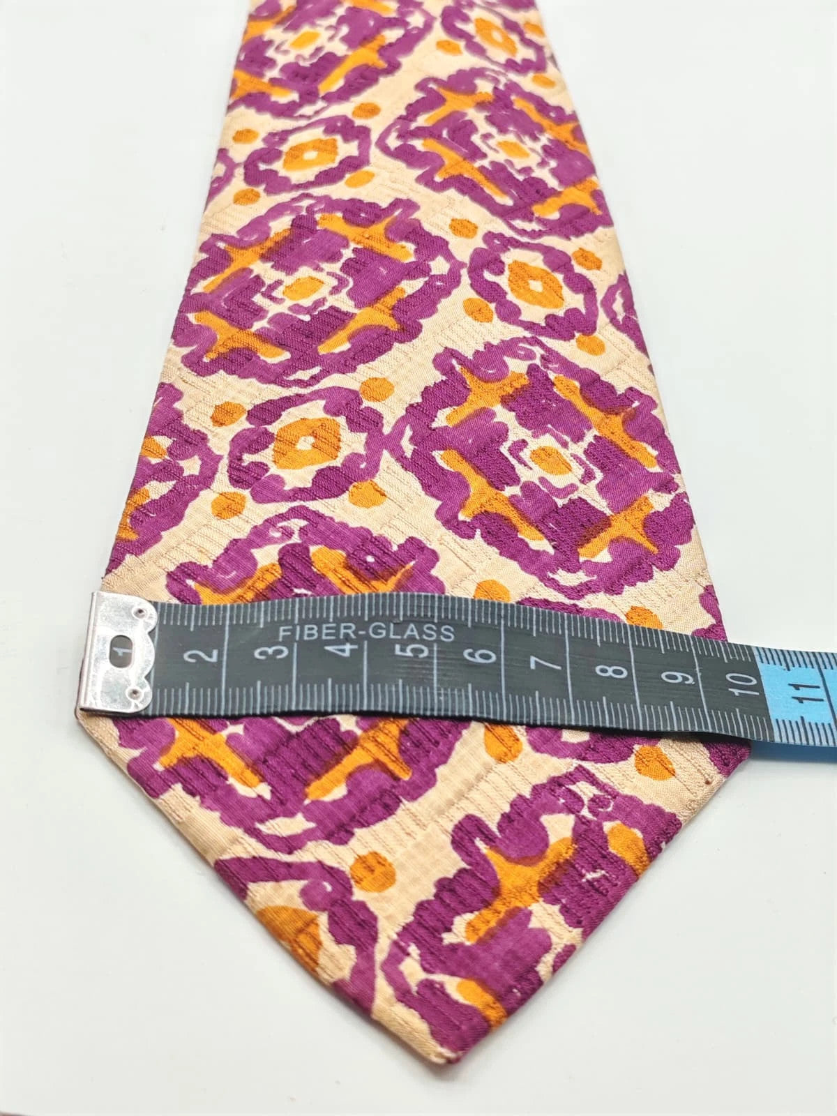 Cravatta vintage Ruffatti Torino in seta, fantasia geometrica viola e ocra
