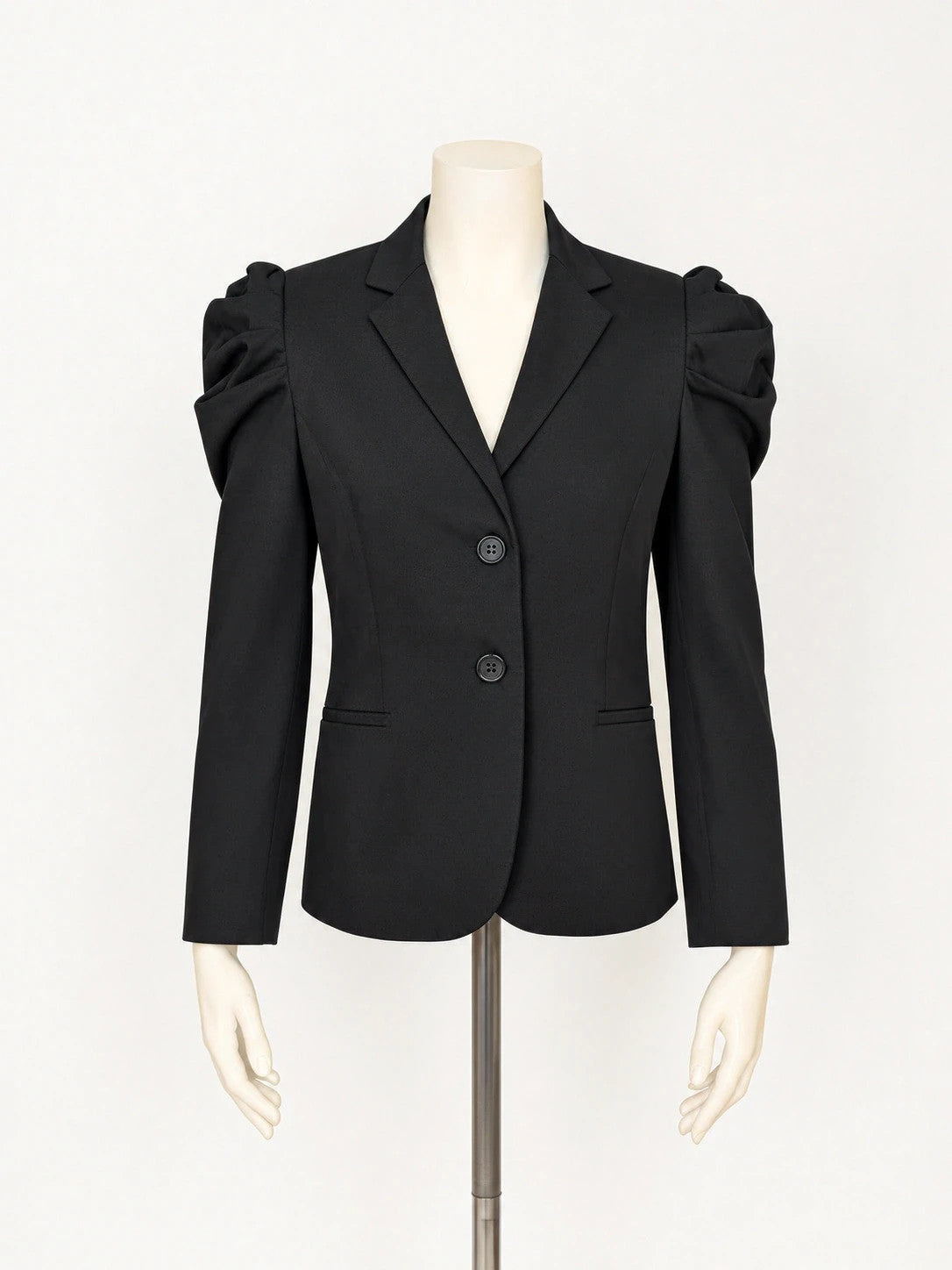 Fast Fashion Extyn black blazer with balloon sleeves and two-button closure, made in Italy.