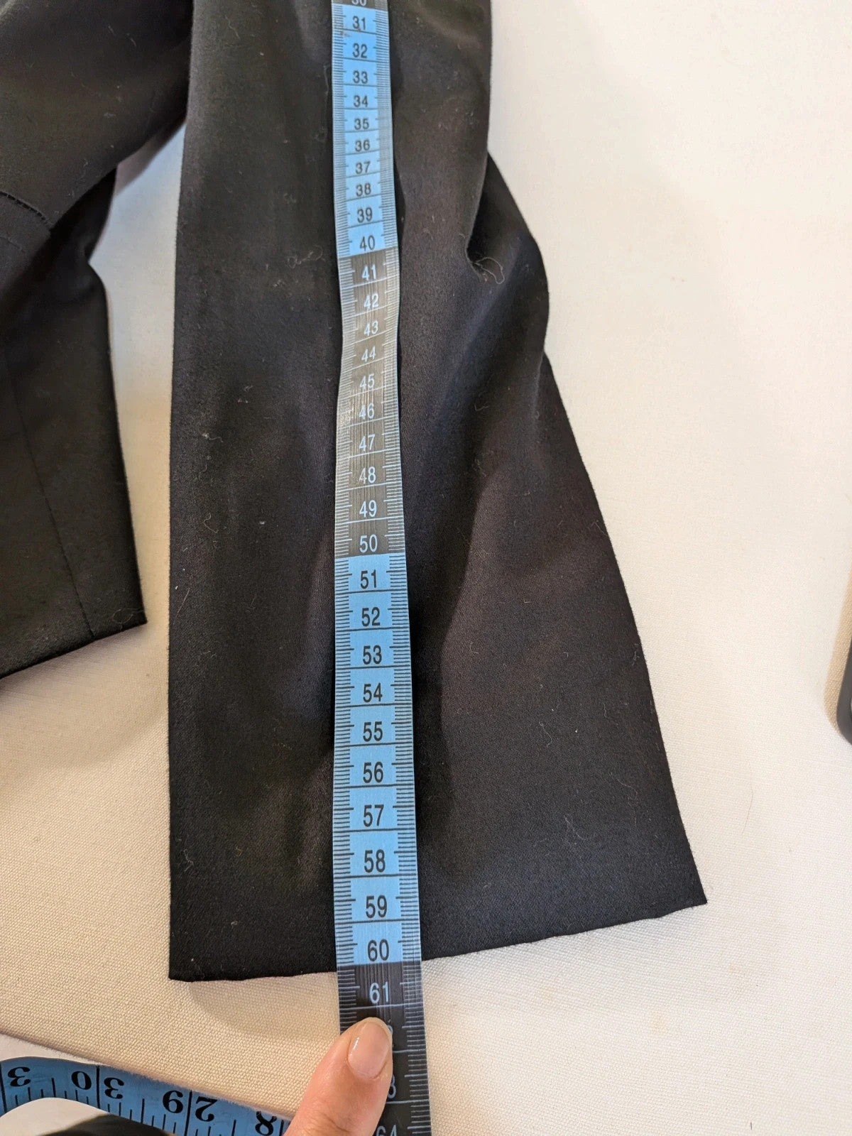 Fast Fashion Extyn black blazer with balloon sleeves and two-button closure, made in Italy.