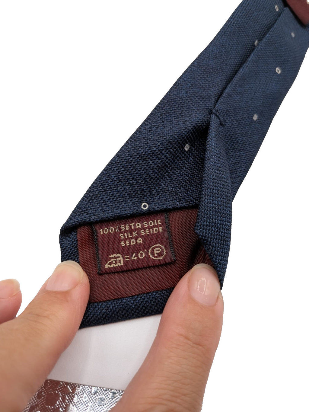 Hugo Parsons navy tie with geometric beige polka dot pattern, handmade in Italy.