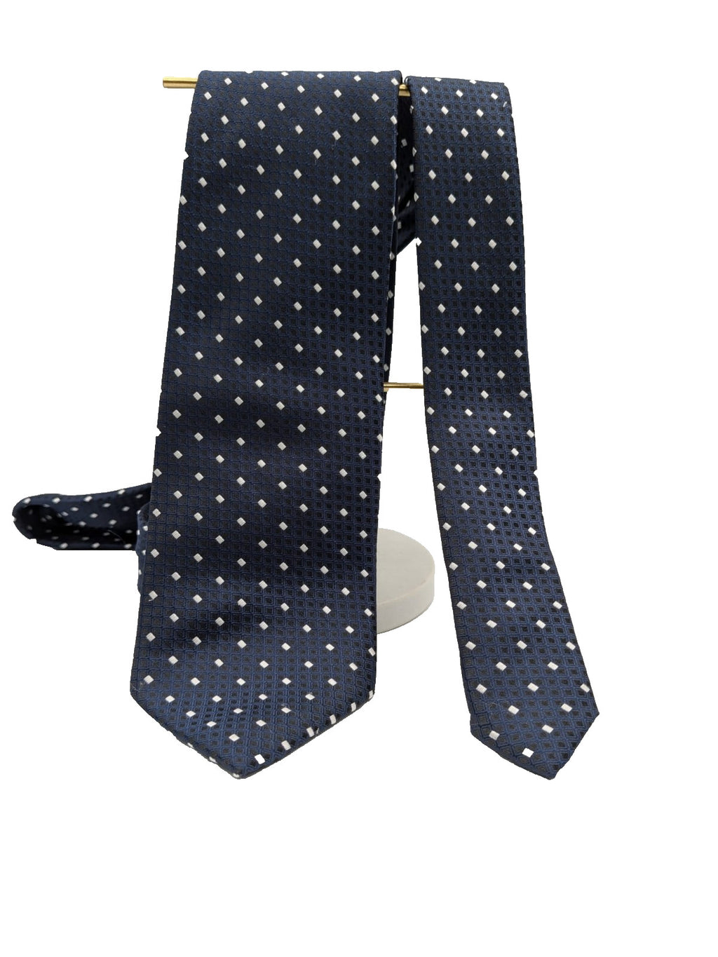 Uomo navy necktie with jacquard polka dot pattern and classic pointed style.