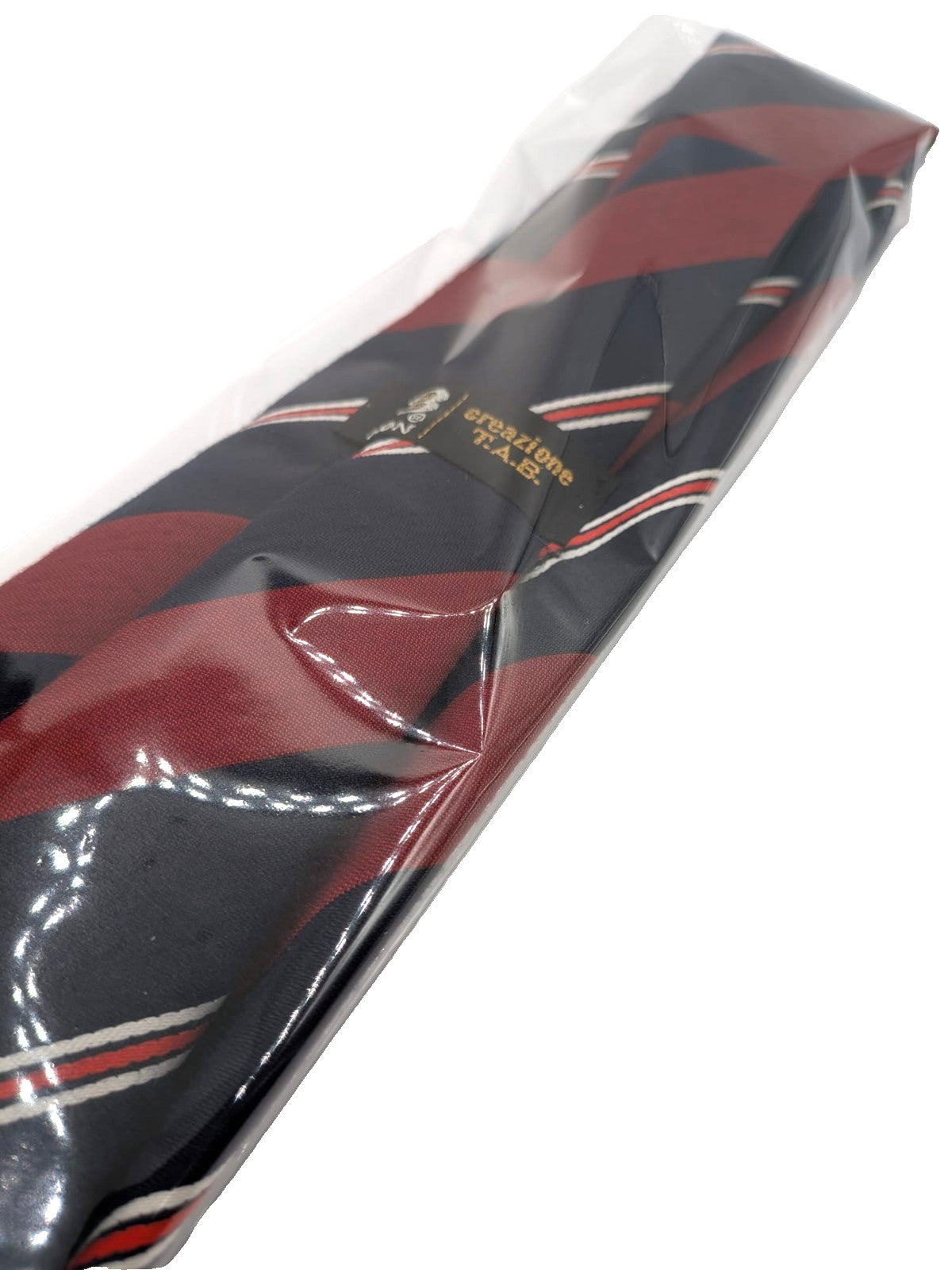 Blazer necktie navy with regimental diagonal stripes in blue, burgundy, white, and red.