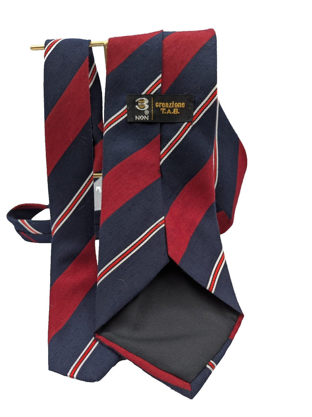 Blazer necktie navy with regimental diagonal stripes in blue, burgundy, white, and red.