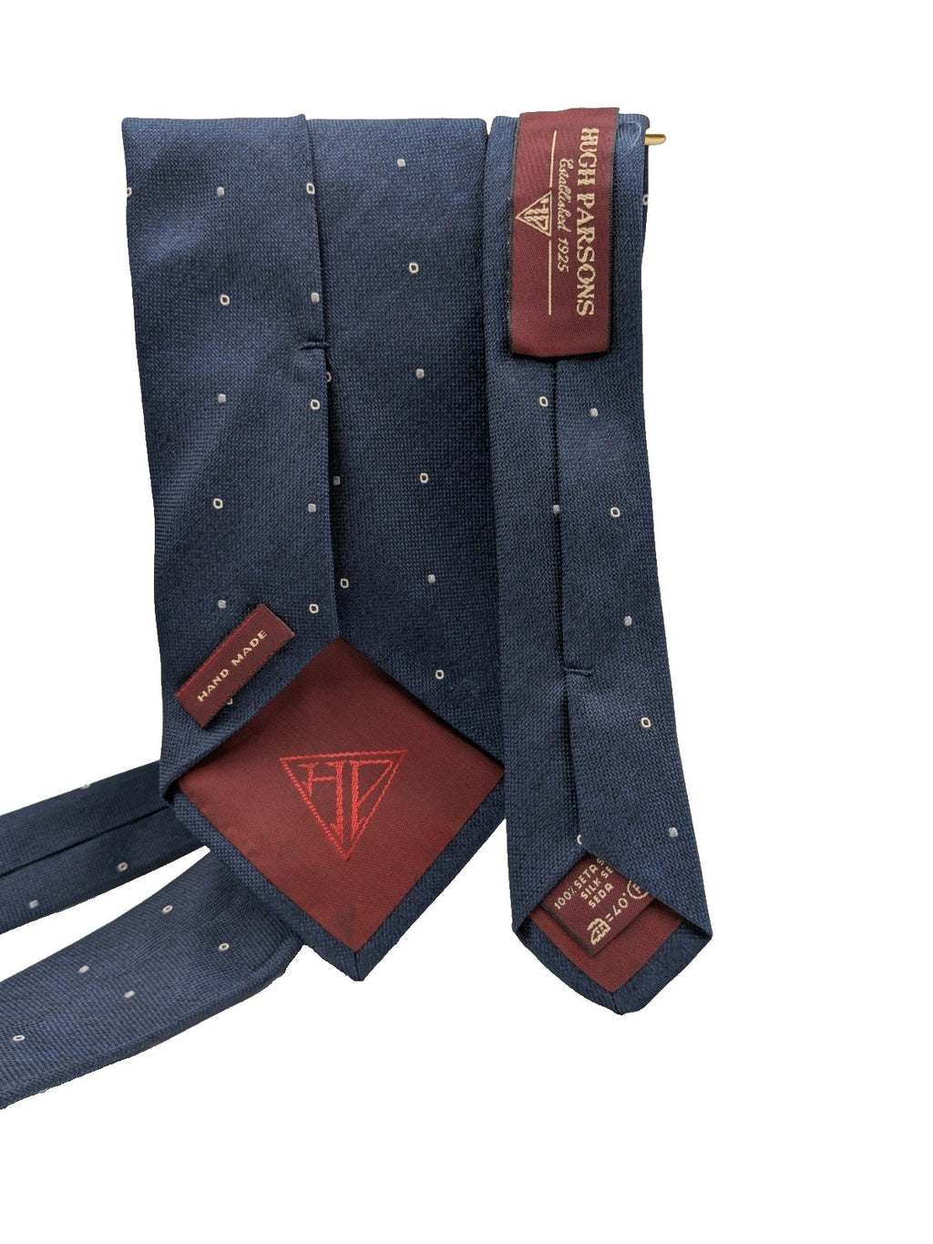Hugo Parsons navy tie with geometric beige polka dot pattern, handmade in Italy.